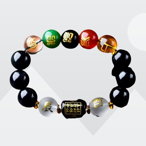 Five-Element Obsidian Bracelet featuring 10mm black beads, symbolizing wealth and prosperity with Feng Shui elements.