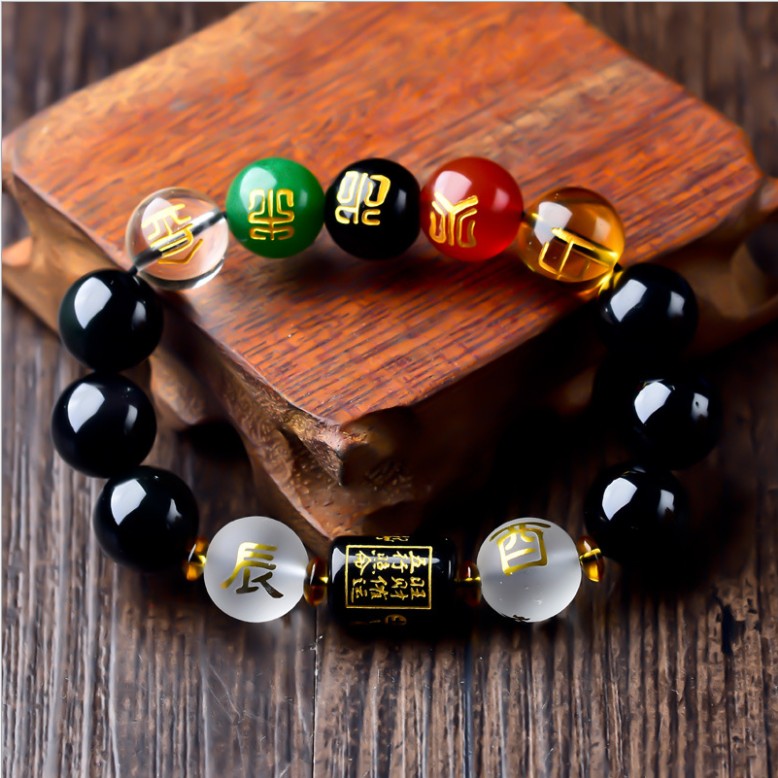 Five-Element Obsidian Bracelet featuring 10mm black beads, symbolizing wealth and prosperity with Feng Shui elements.
