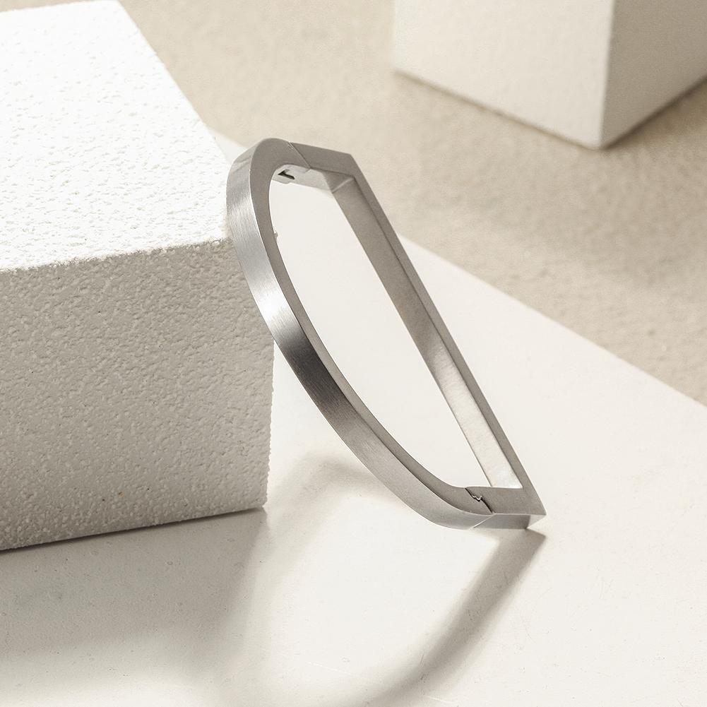 A sleek Flat Bar Cuff Bangle made of 316L surgical stainless steel with 14K gold PVD plating, showcasing its elegant and modern design.