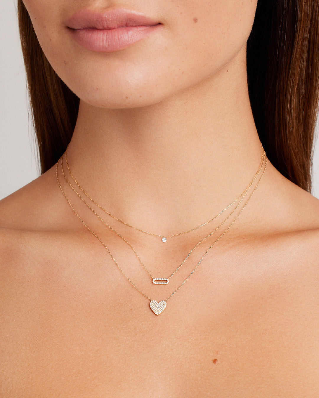 A stunning Floating Diamond Necklace featuring a single lab-grown diamond in a unique floating design, showcasing elegance and sophistication.