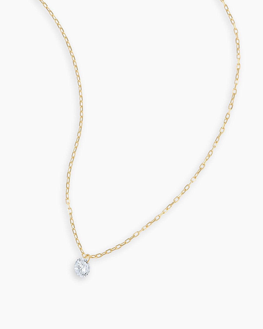 A stunning Floating Diamond Necklace featuring a single lab-grown diamond in a unique floating design, showcasing elegance and sophistication.