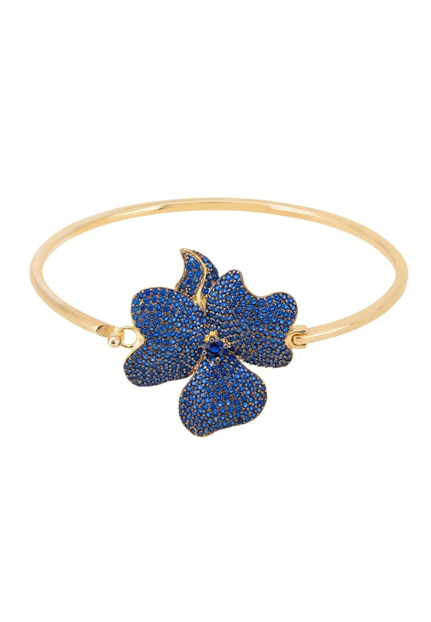 Elegant Flower Large Statement Cuff Bracelet in gold with sapphire blue zirconia, featuring a floral design on a polished metallic bangle.