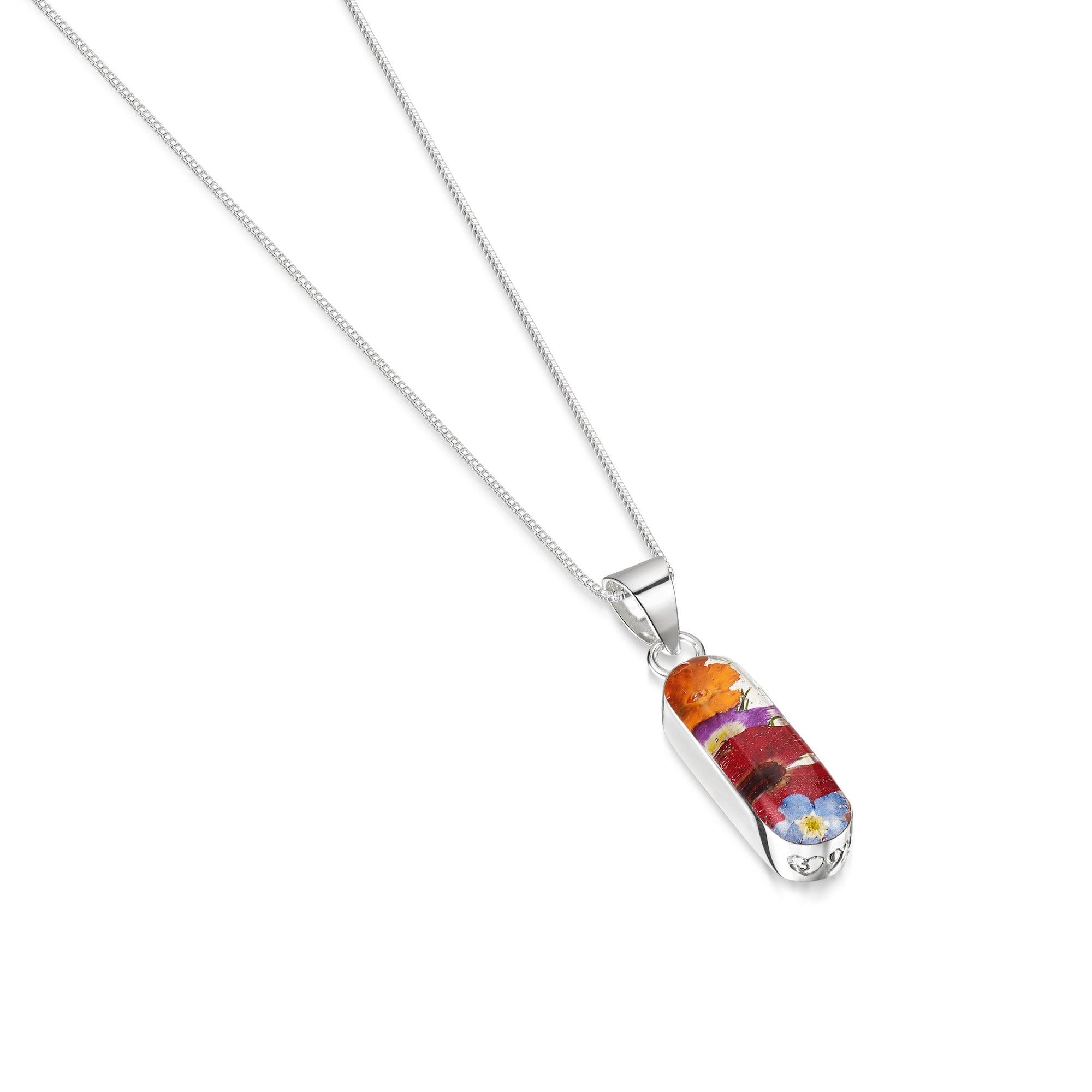Elegant Flower Necklace by Shrieking Violet® featuring a vertical bar pendant filled with real dried flowers, on a sterling silver chain.