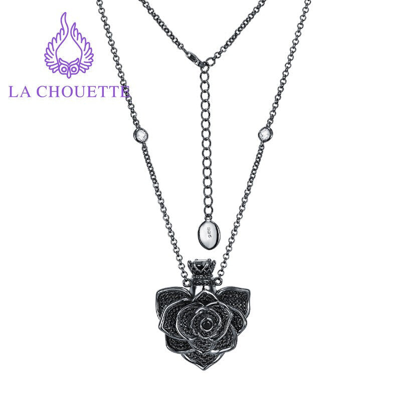 Elegant flower perfume open black plating necklace for women, featuring an adjustable chain and a beautiful floral design.