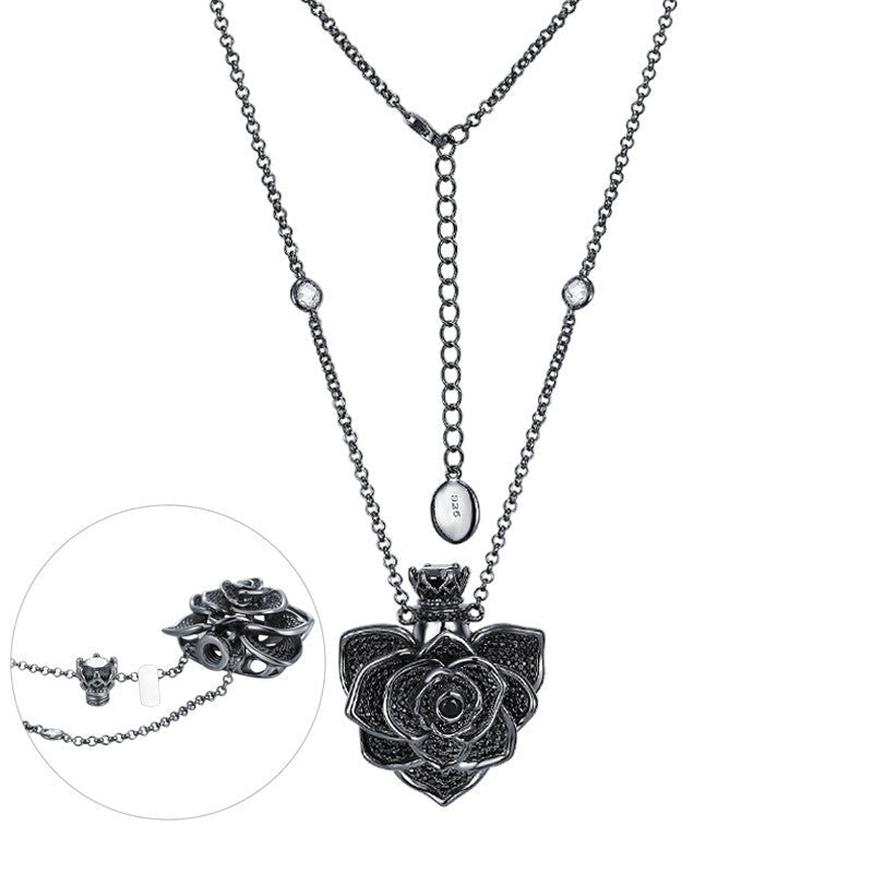 Elegant flower perfume open black plating necklace for women, featuring an adjustable chain and a beautiful floral design.
