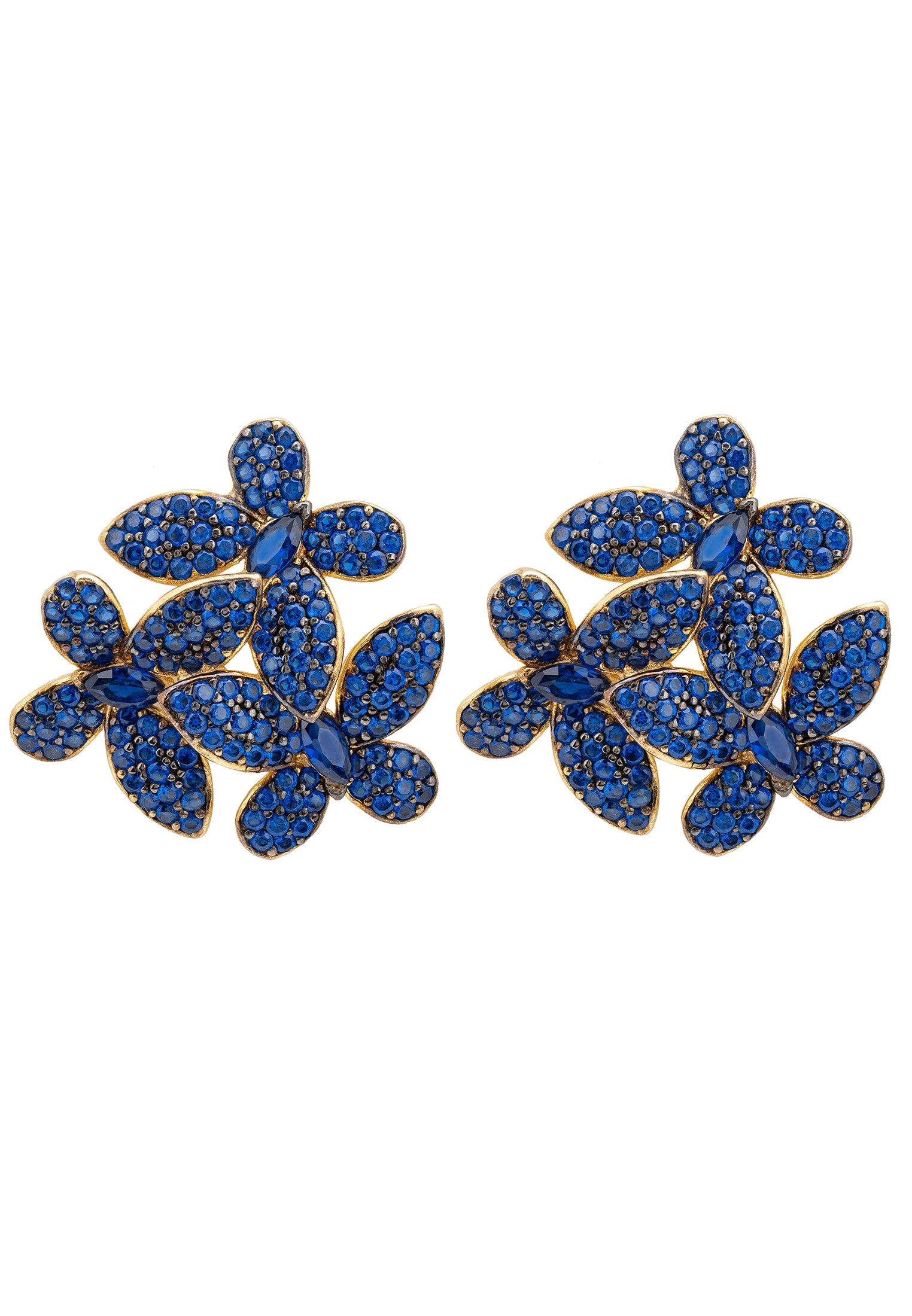 Elegant gold stud earrings featuring floral design with blue cubic zirconia, perfect for bridal and evening wear.