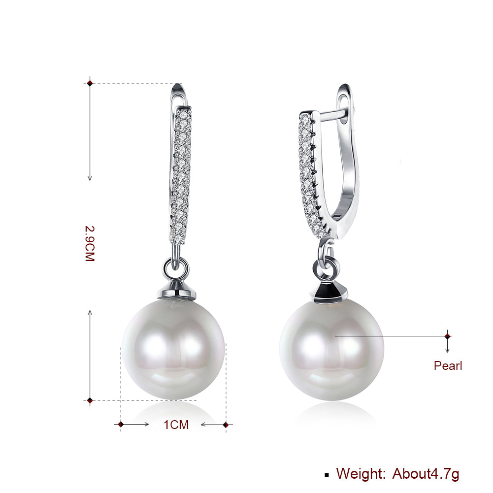 Elegant freshwater pearl drop earrings in 18K white gold plating with crystals, displayed in a white gift box.