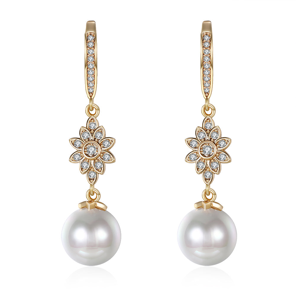 Elegant Freshwater Pearl Starburst Drop Earrings in 18K gold plating, showcasing a luxurious design with hypoallergenic features.
