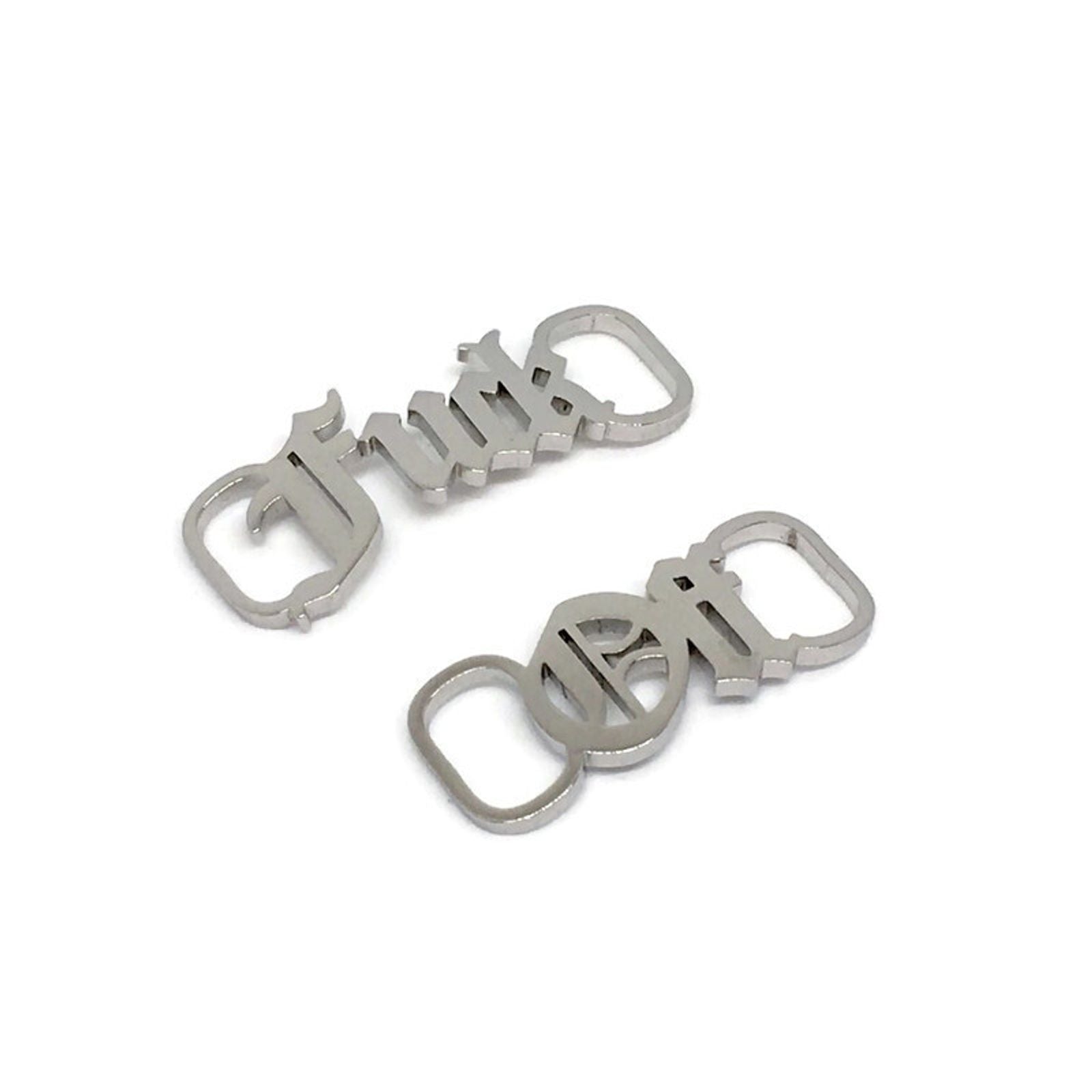 A pair of stainless steel Fuck Off Shoelace Buckles in various colors, showcasing their sleek design and durability.