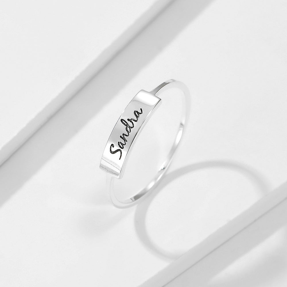 A beautiful hand-made Full Silver Name-1 Ring, personalized with a name, available in silver, gold, and rose gold finishes.