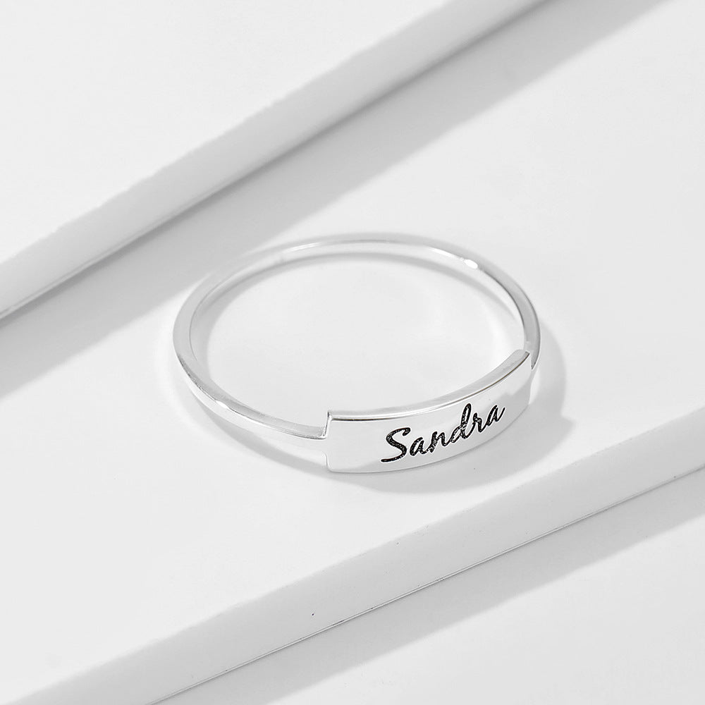 A beautiful hand-made Full Silver Name-1 Ring, personalized with a name, available in silver, gold, and rose gold finishes.