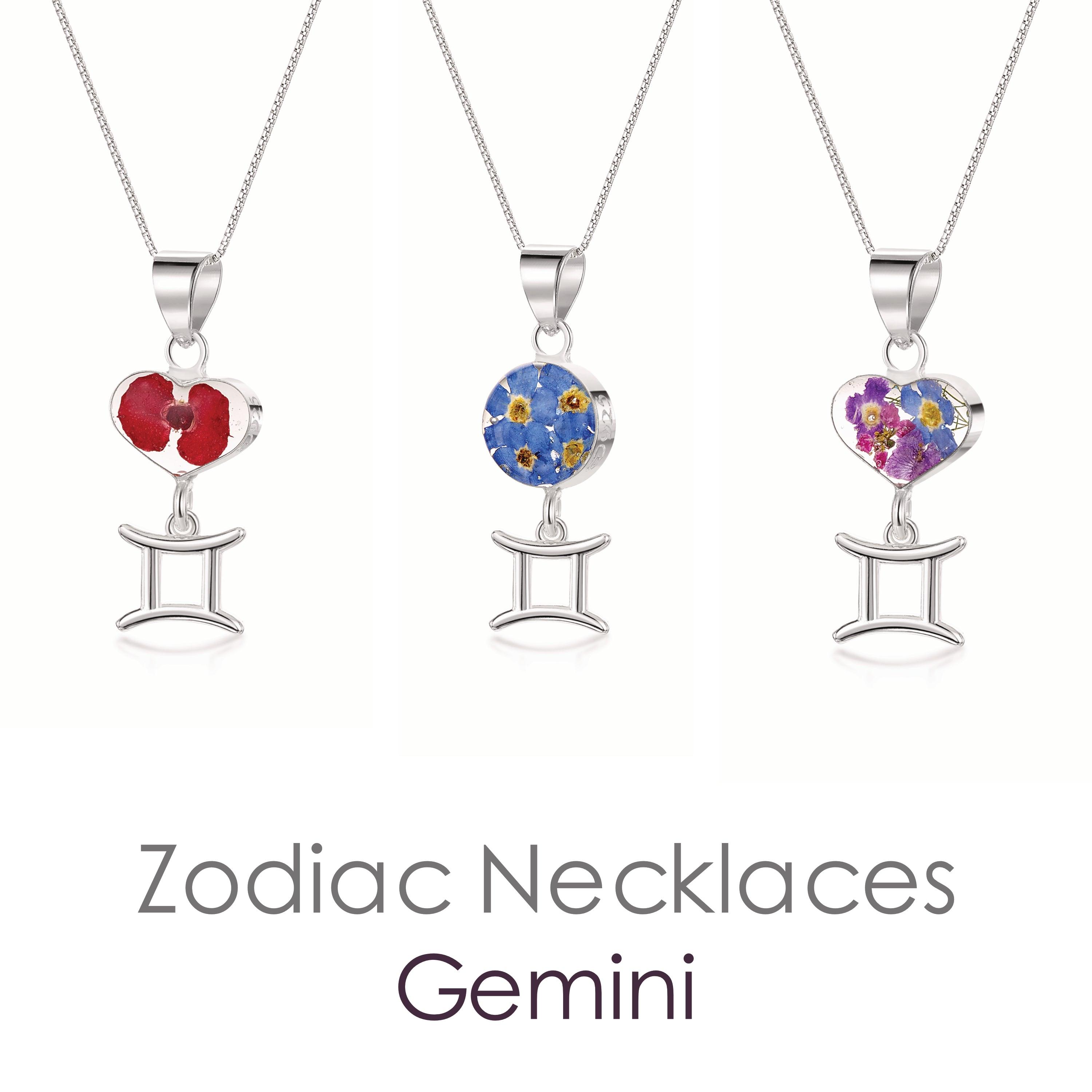 Gemini Necklace featuring a sterling silver pendant with real preserved flowers and a zodiac charm, showcasing elegance and individuality.