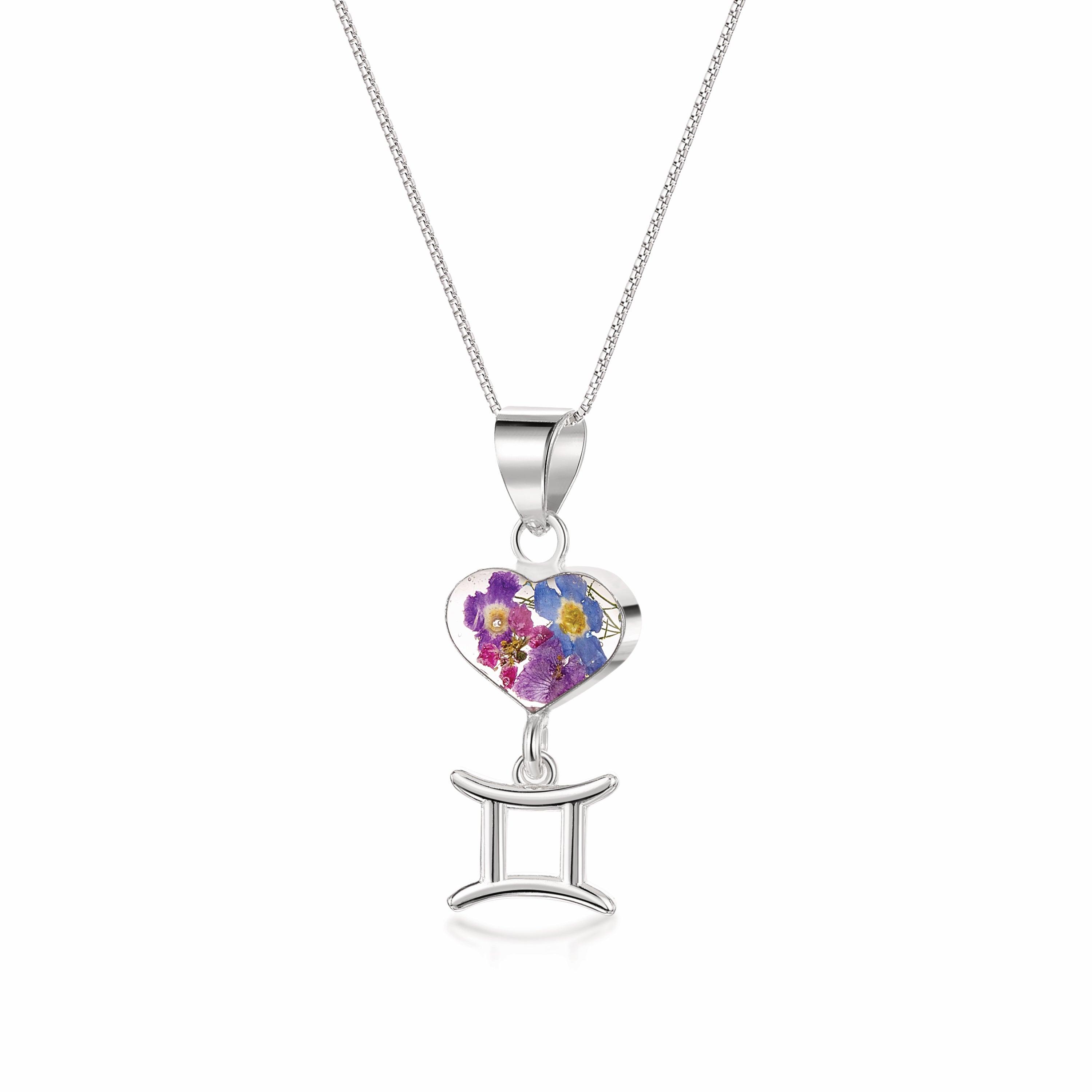 Gemini Necklace featuring a sterling silver pendant with real preserved flowers and a zodiac charm, showcasing elegance and individuality.