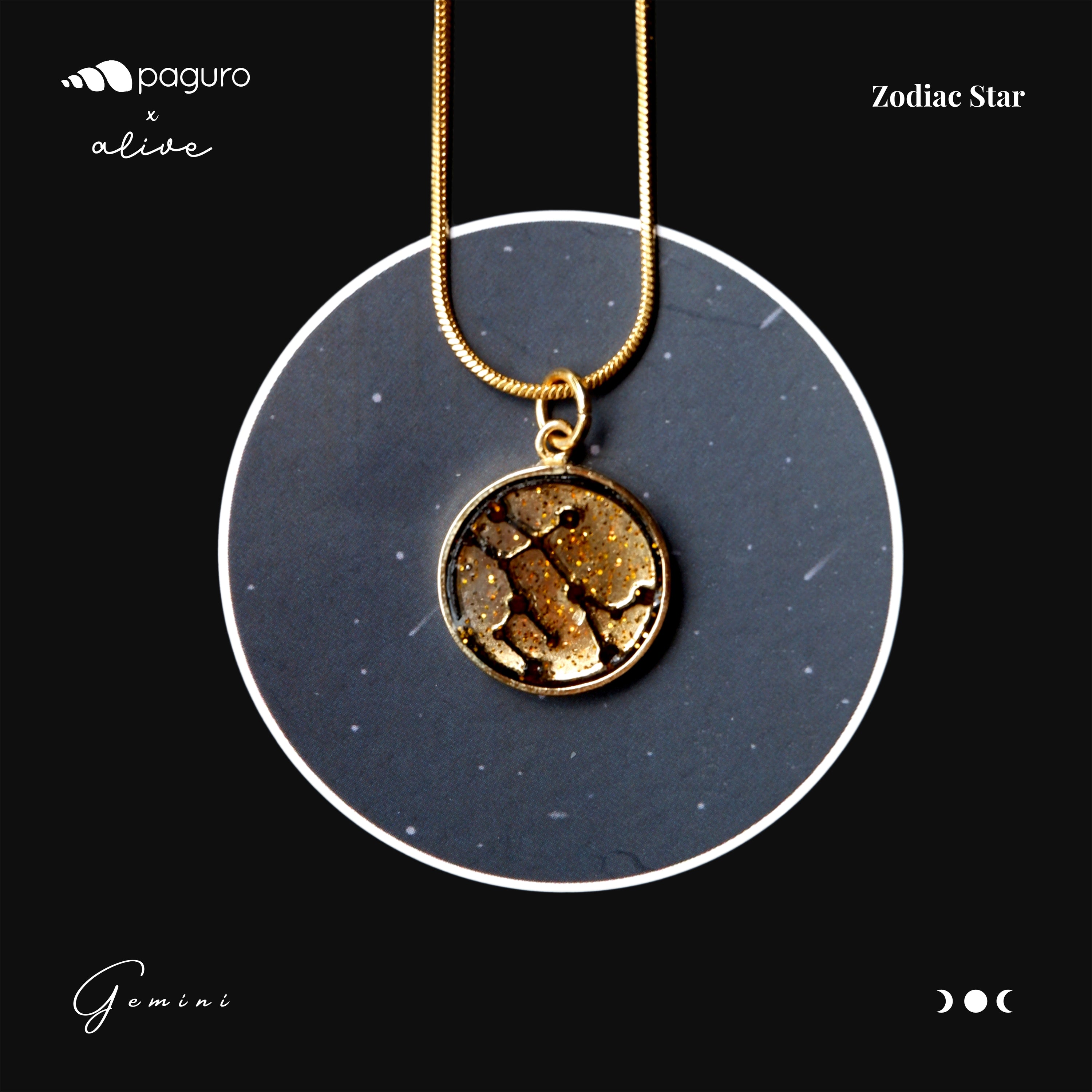 Gemini Zodiac Sign Sustainable Necklace featuring a gold plated brass pendant with recycled wood and plant resin, showcasing intricate craftsmanship.