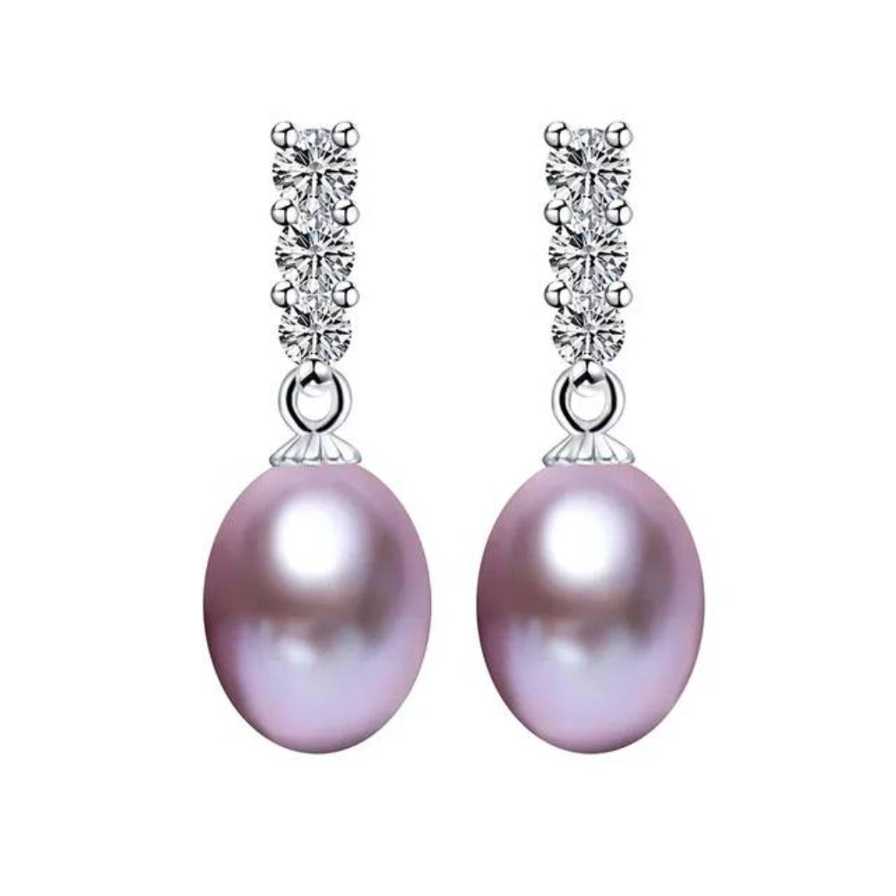 A pair of elegant drop earrings featuring genuine freshwater pearls in various colors, adorned with simulated diamonds for added sparkle.