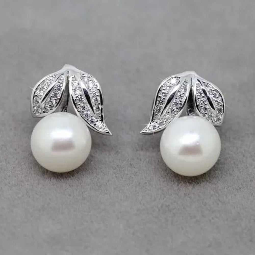Genuine Freshwater Pearl and Simulated Diamond Leaf Stud Earrings showcasing elegant leaf design with multiple pearl color options.