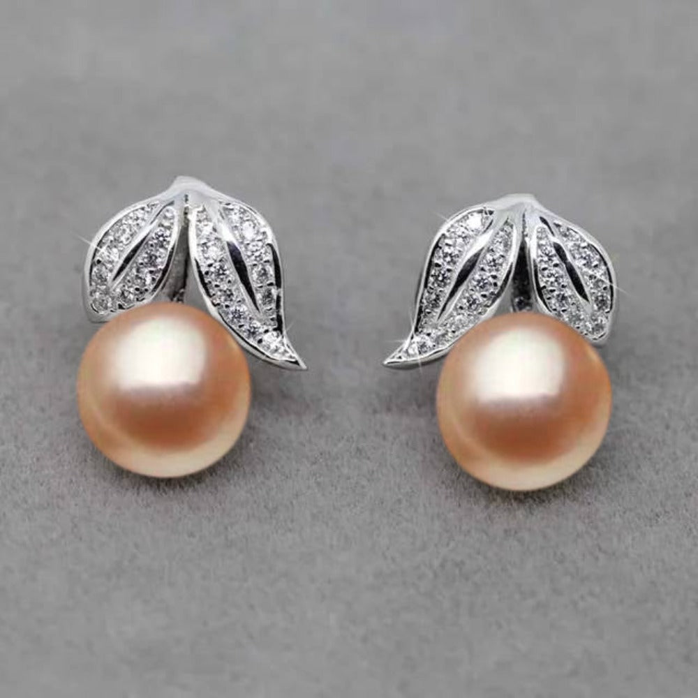 Genuine Freshwater Pearl and Simulated Diamond Leaf Stud Earrings showcasing elegant leaf design with multiple pearl color options.
