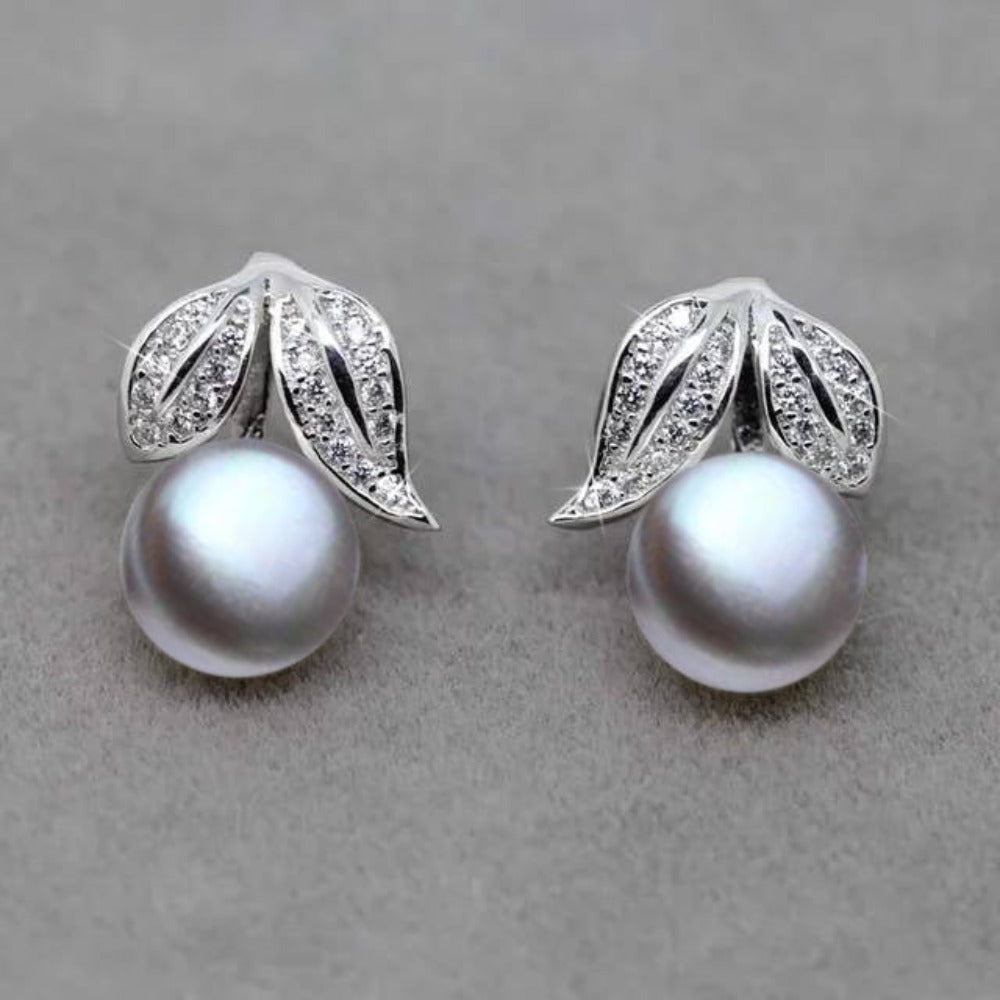 Genuine Freshwater Pearl and Simulated Diamond Leaf Stud Earrings showcasing elegant leaf design with multiple pearl color options.