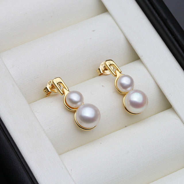 Genuine Freshwater Pearl Double Drop Earrings in Gold featuring black and white pearls, elegantly designed for a sophisticated look.