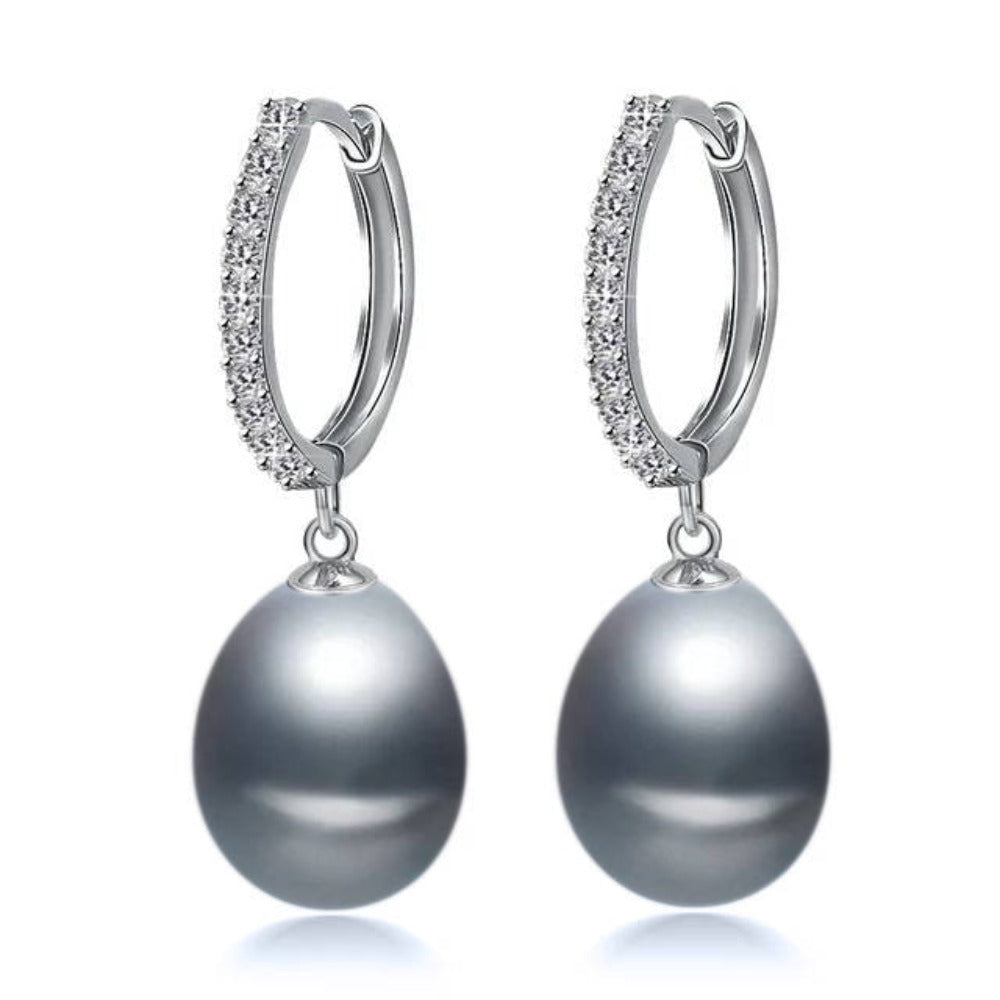 Elegant drop earrings featuring genuine freshwater pearls and simulated diamonds, available in multiple colors.