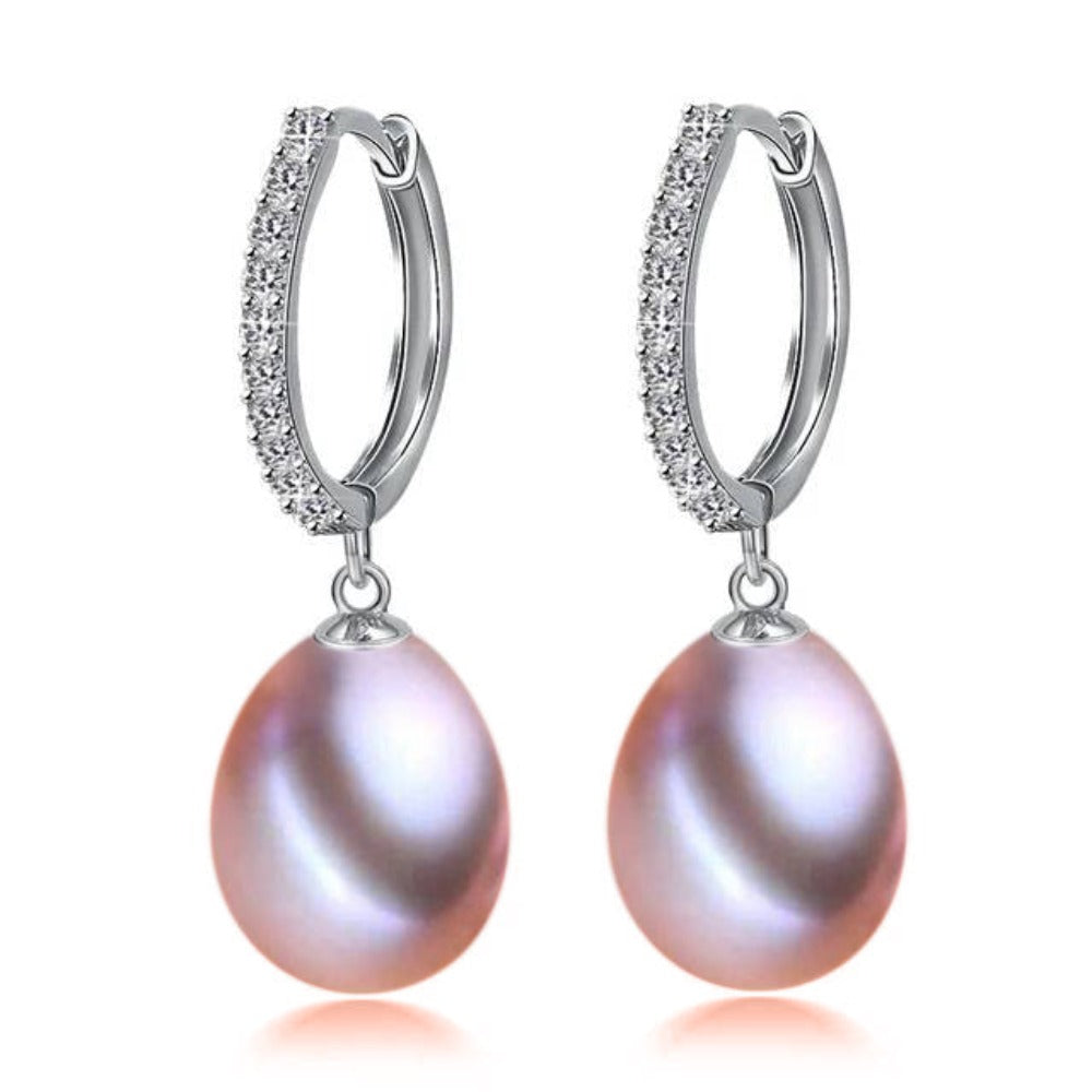 Elegant drop earrings featuring genuine freshwater pearls and simulated diamonds, available in multiple colors.