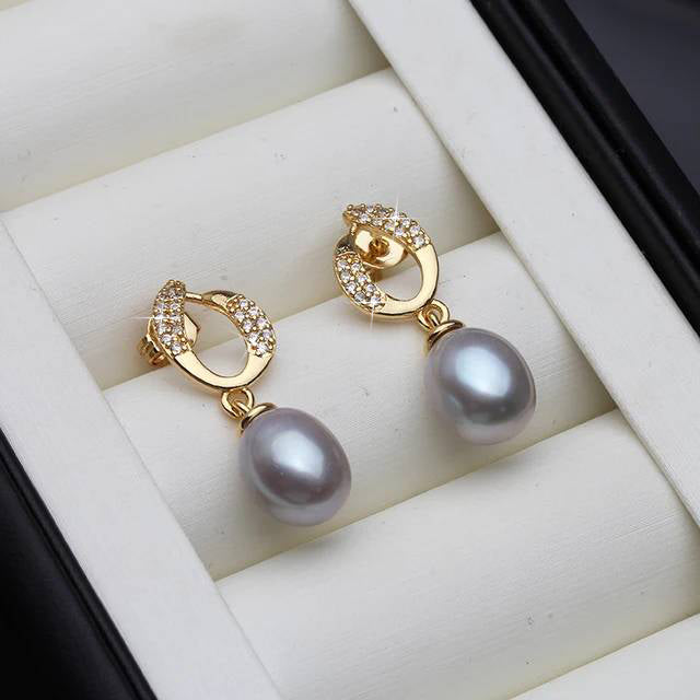 Elegant Genuine Freshwater Pearl & Simulated Diamond Eternity Drop Earrings showcasing white pearls in a stylish drop design.