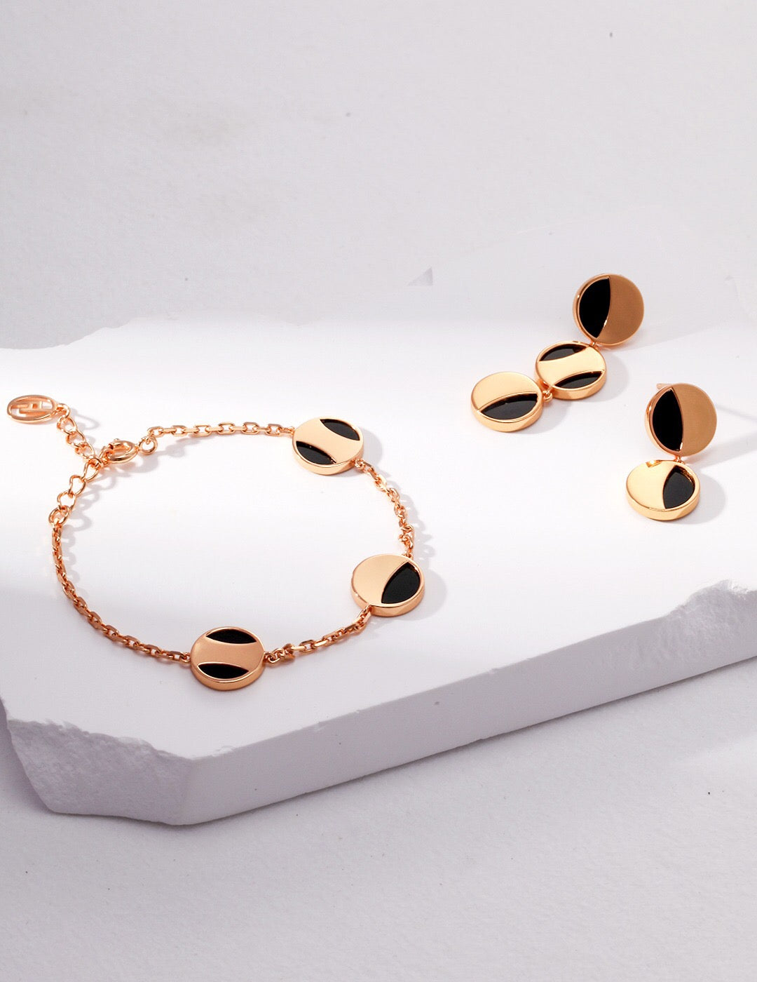 A stunning Geometric Round Black Onyx Necklace featuring a round black onyx pendant on a gold vermeil chain, elegantly displayed.