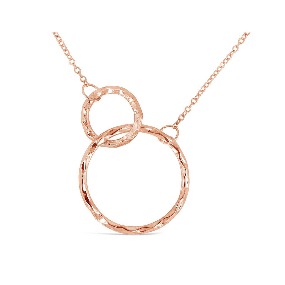 A delicate necklace featuring entwined infinity circles on a fine cable chain, showcasing a shimmering hammered finish.