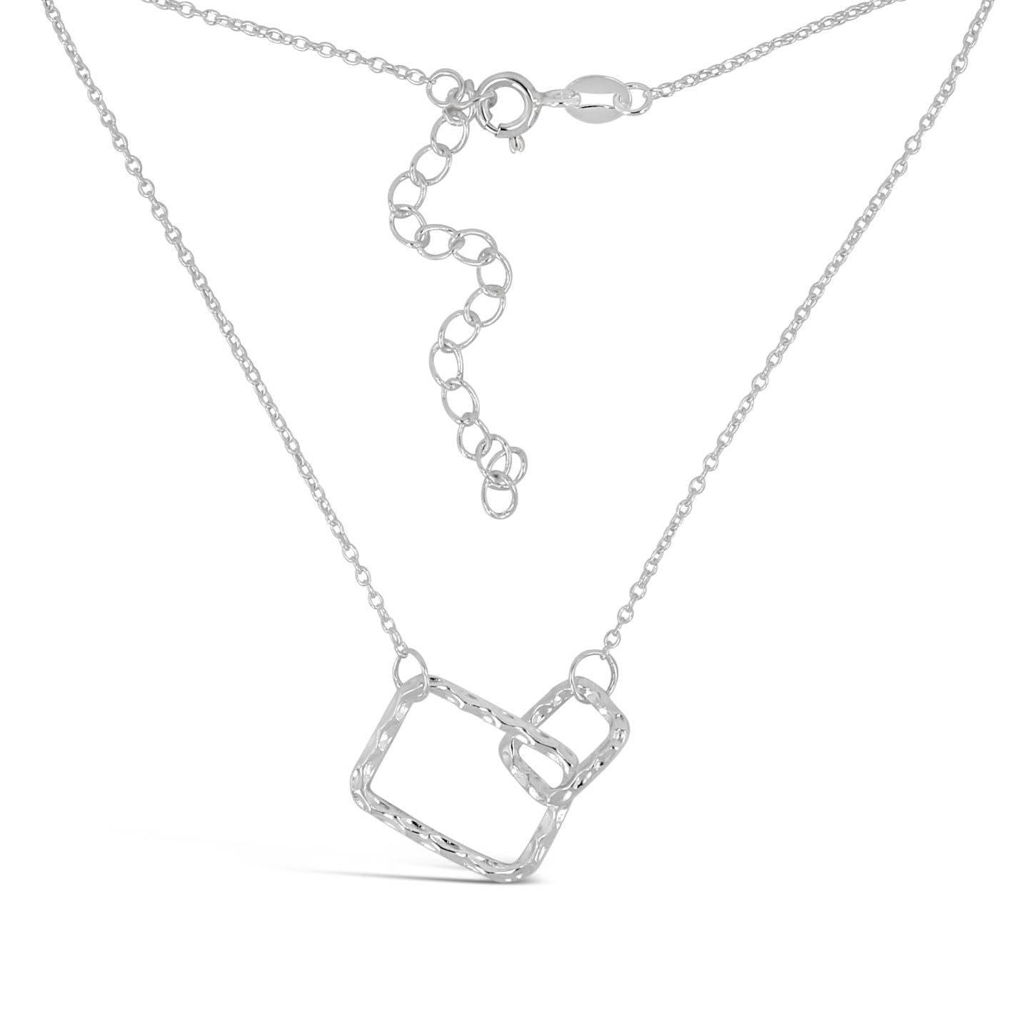 A delicate necklace featuring entwined infinity circles on a fine cable chain, showcasing a shimmering hammered finish.
