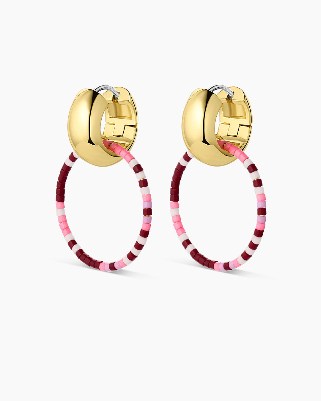 Elegant Gigi Drop Hoops in 14k gold, showcasing their stylish design and lightweight structure.