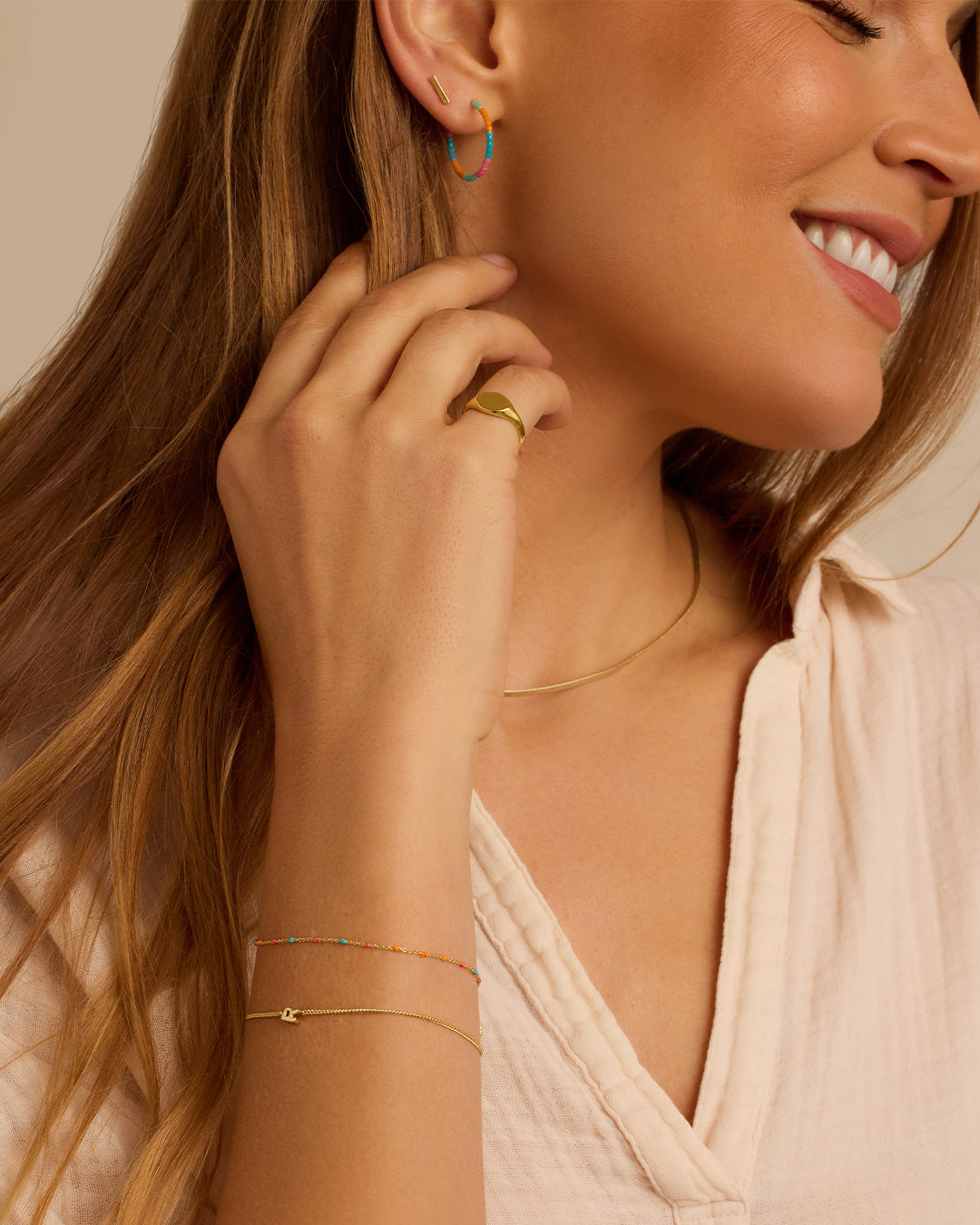 Gigi Stripe Hoops in 14k gold, elegantly designed for stacking and layering.