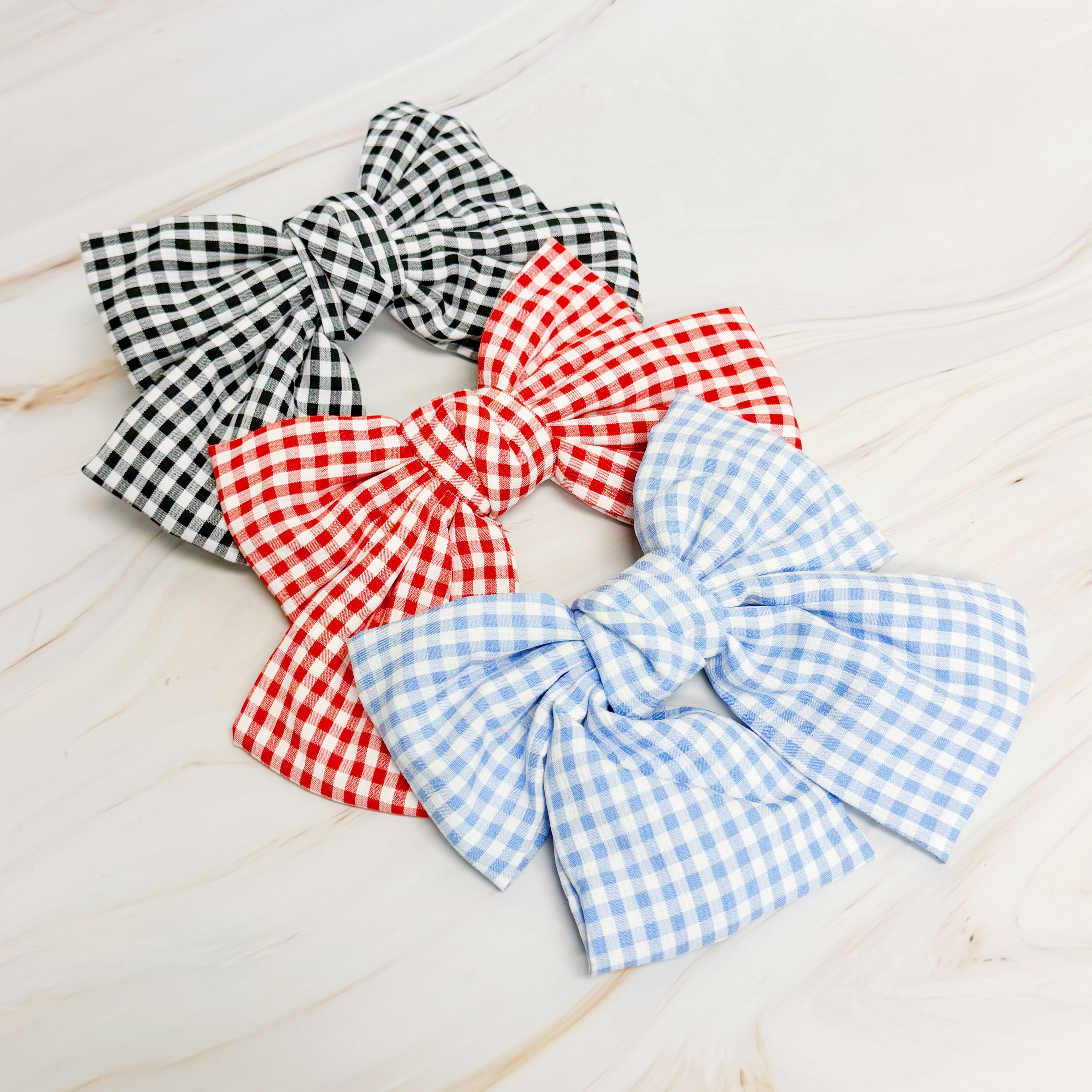 Gingham Bow Pretty Bow Hair Clip featuring a charming checkered pattern and elegant bow design, perfect for various hairstyles.