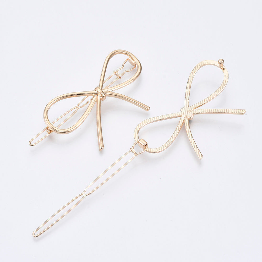 Gold Bow Hair Slide featuring a chic bow design, made from durable metal alloy, perfect for elegant hairstyles.