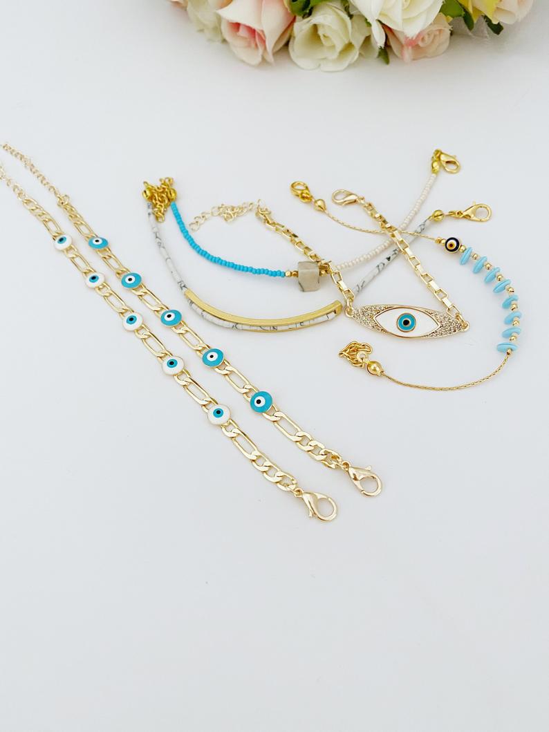 Gold Evil Eye Bracelet featuring vibrant seed beads and adjustable stainless steel design, perfect for everyday wear.