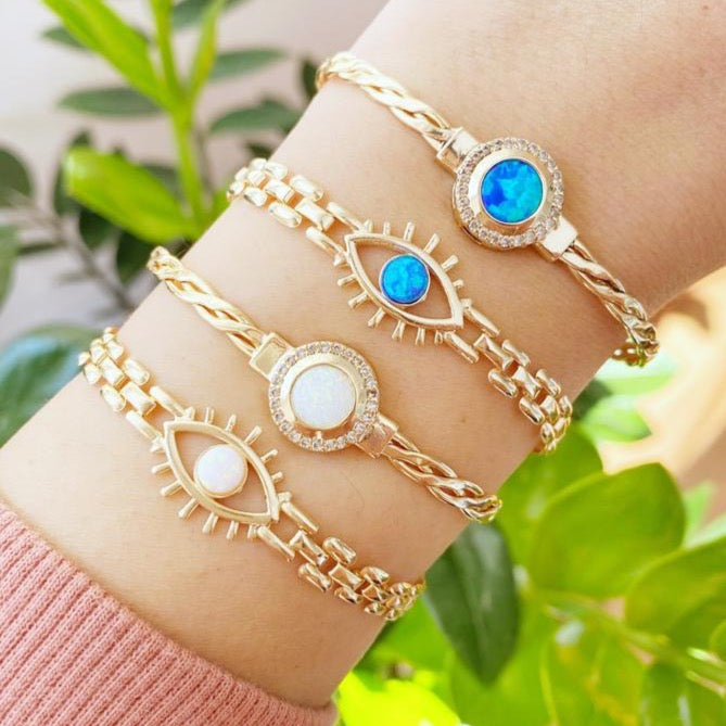 Gold Evil Eye Bracelet featuring blue and white opal beads, handmade with adjustable stainless steel material.