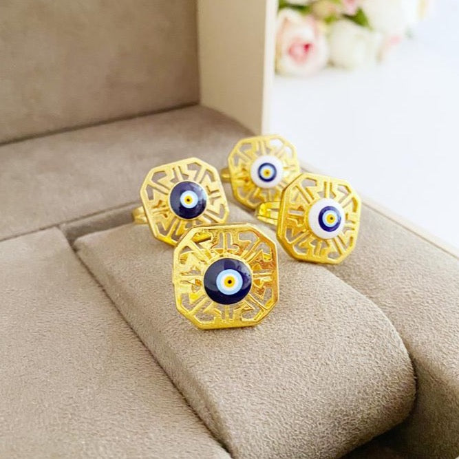 A stunning Gold Evil Eye Ring featuring a blue evil eye design, adjustable for all sizes, perfect for boho style enthusiasts.