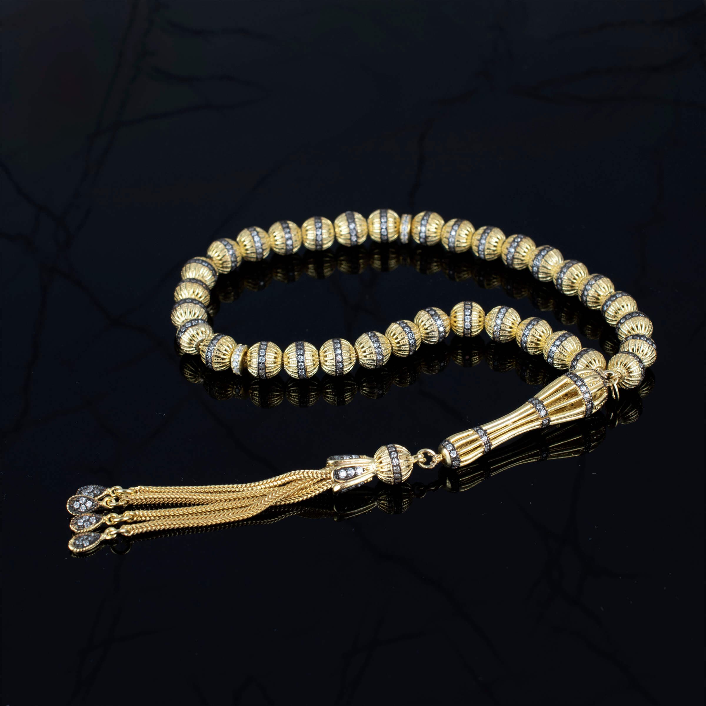 Gold Plated Sterling Silver Tasbih with 33 Zirconia beads, elegantly designed for prayer and meditation.