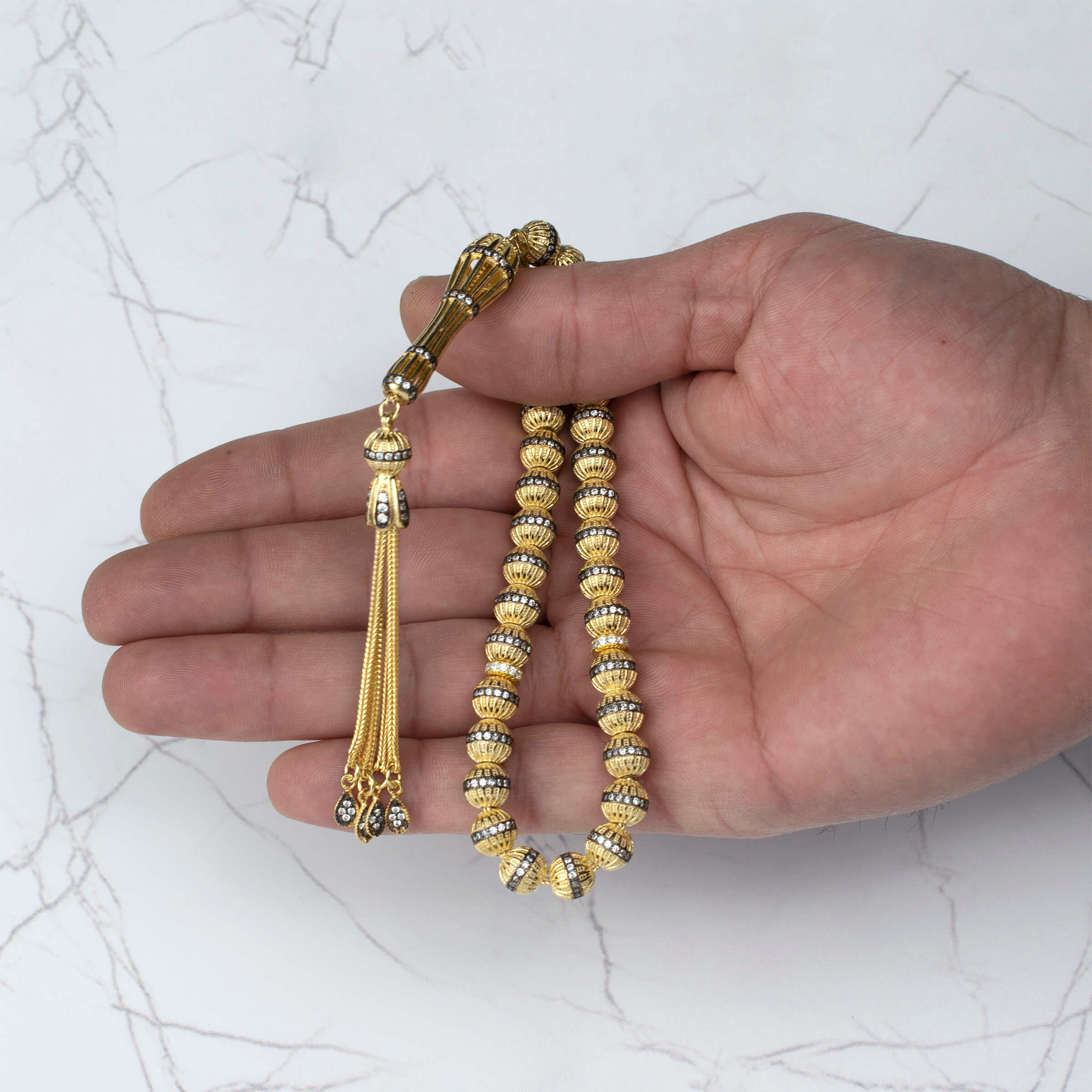 Gold Plated Sterling Silver Tasbih with 33 Zirconia beads, elegantly designed for prayer and meditation.