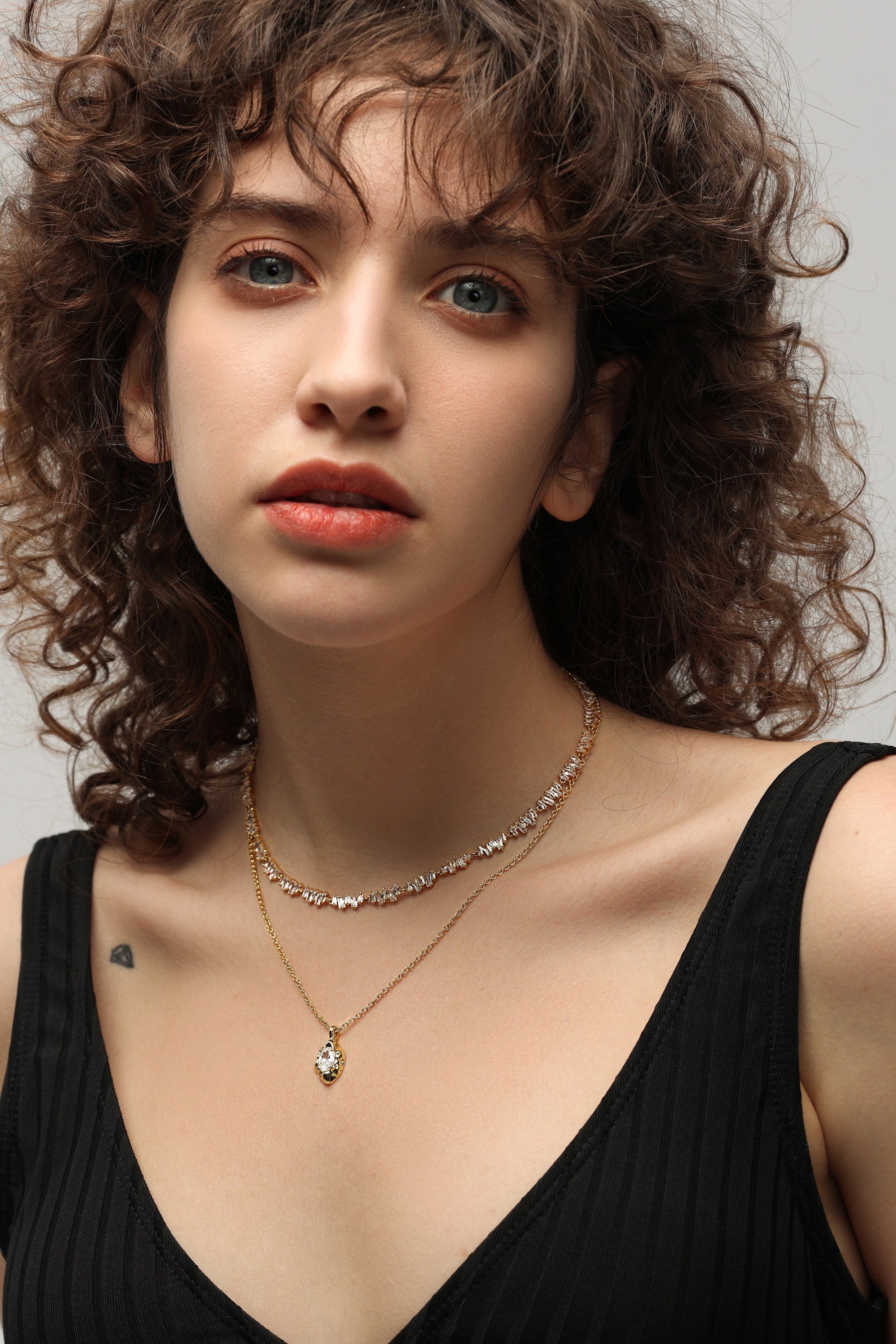 Gold T Shape Zirconia Tennis Choker Necklace featuring irregular design and sparkling cubic zirconia stones.