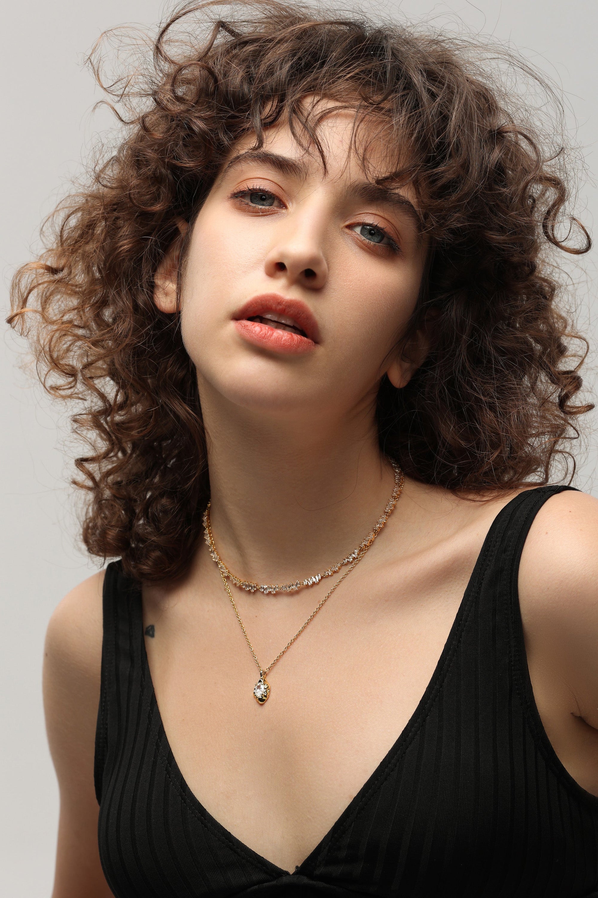 Gold T Shape Zirconia Tennis Choker Necklace featuring irregular design and sparkling cubic zirconia stones.