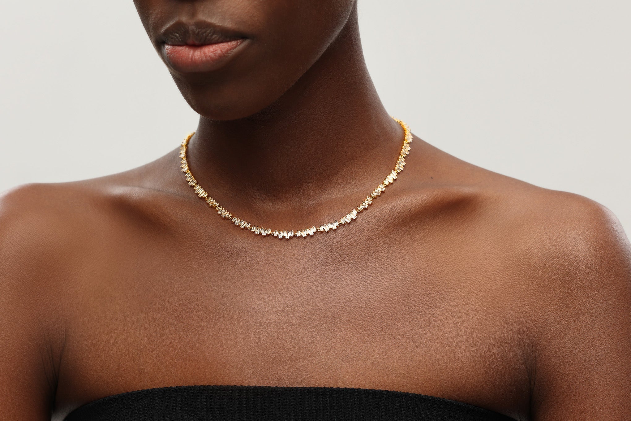 Gold T Shape Zirconia Tennis Choker Necklace featuring irregular design and sparkling cubic zirconia stones.