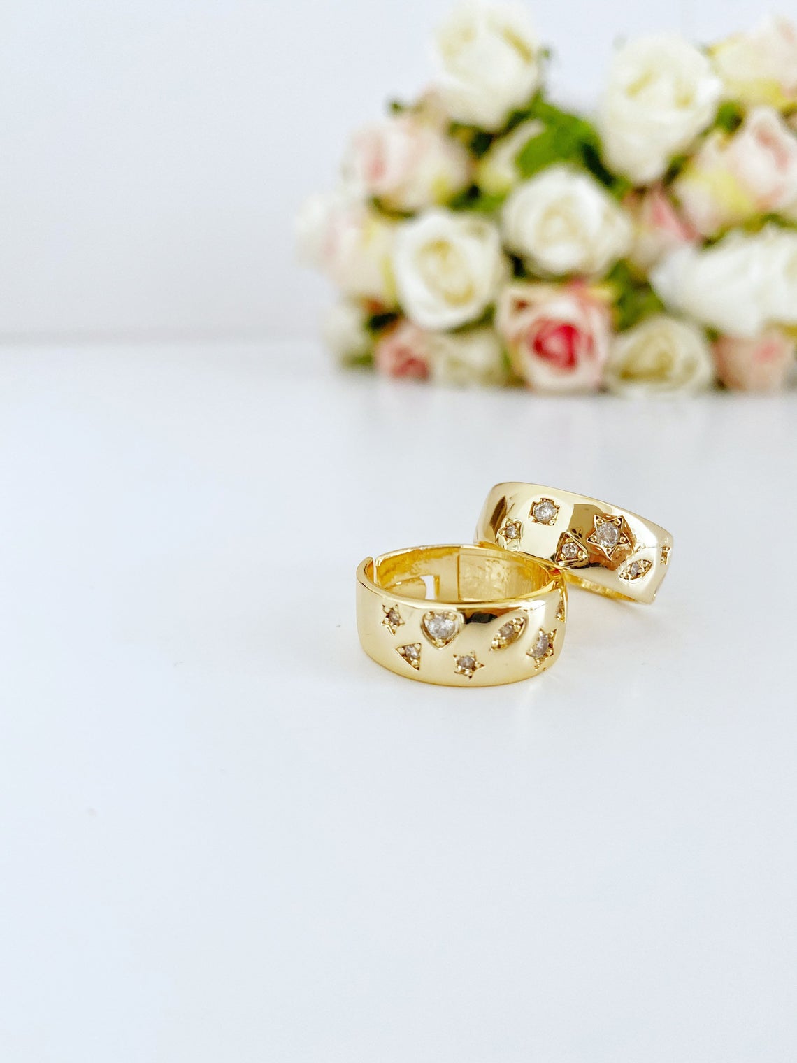 Gold wide band adjustable ring featuring white zircon stones in a geometric design, perfect for stacking and versatile wear.