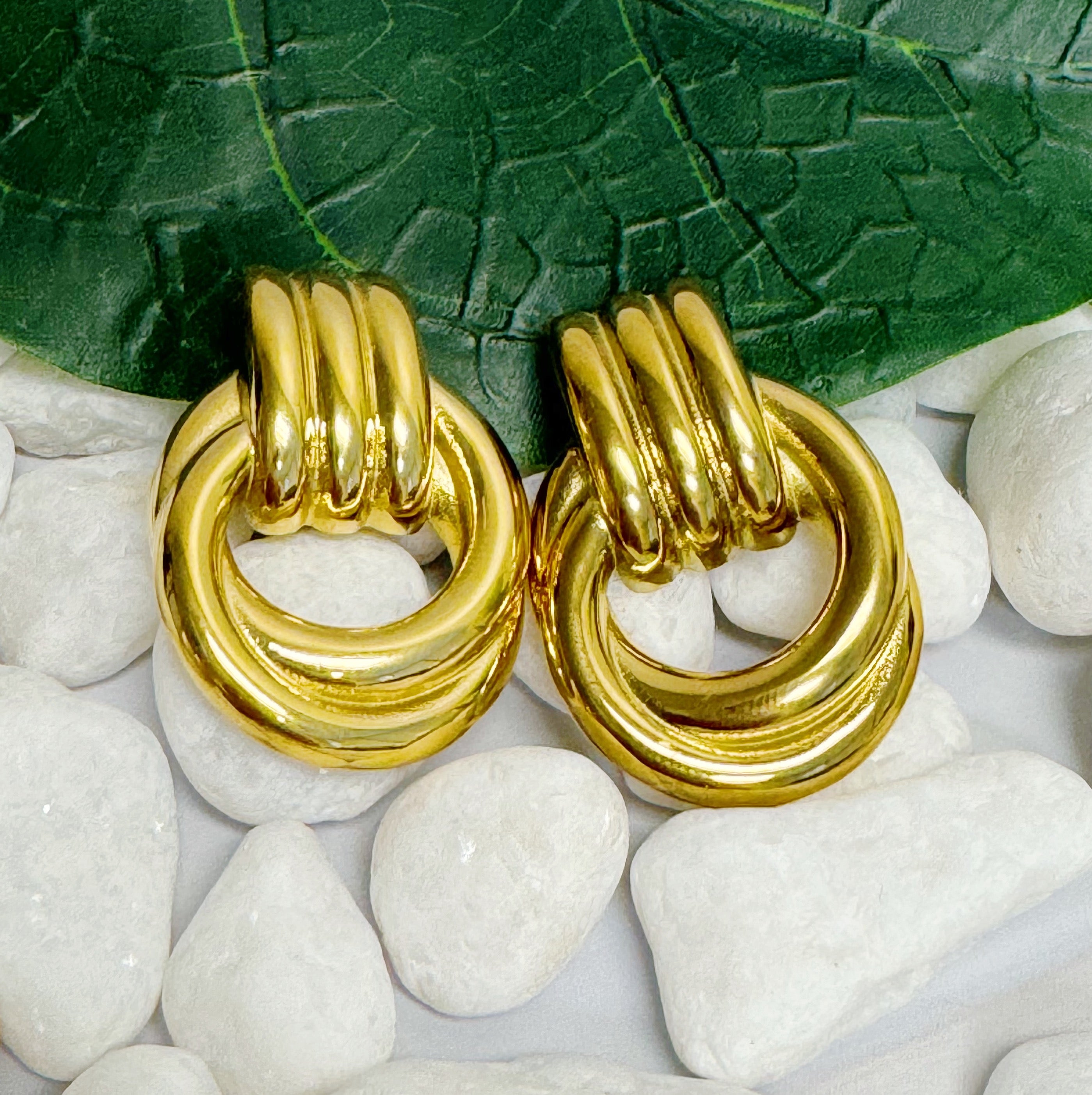 Elegant Golden Knocker Earrings featuring a modern knot design, crafted from 18k gold plated stainless steel.