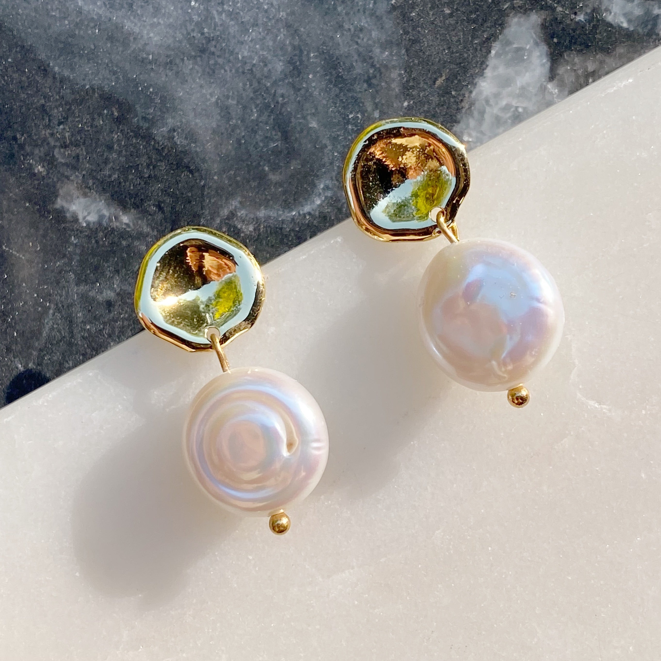 Elegant Golden Shell Pearl Drop Earrings with molten gold top and shell button pearl dangle.