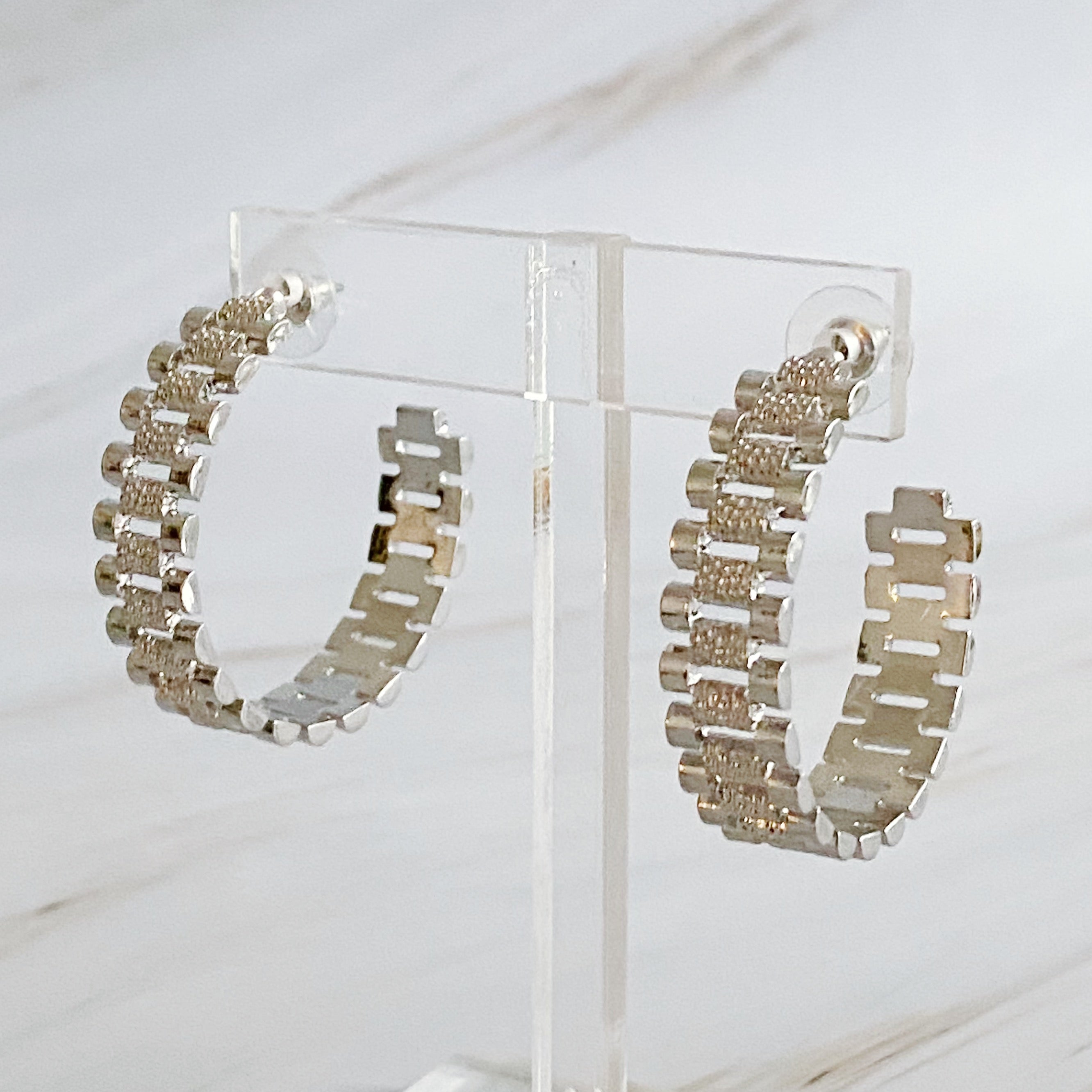 Elegant Golden Watch Band Hoop Earrings with a sleek design, perfect for any occasion.