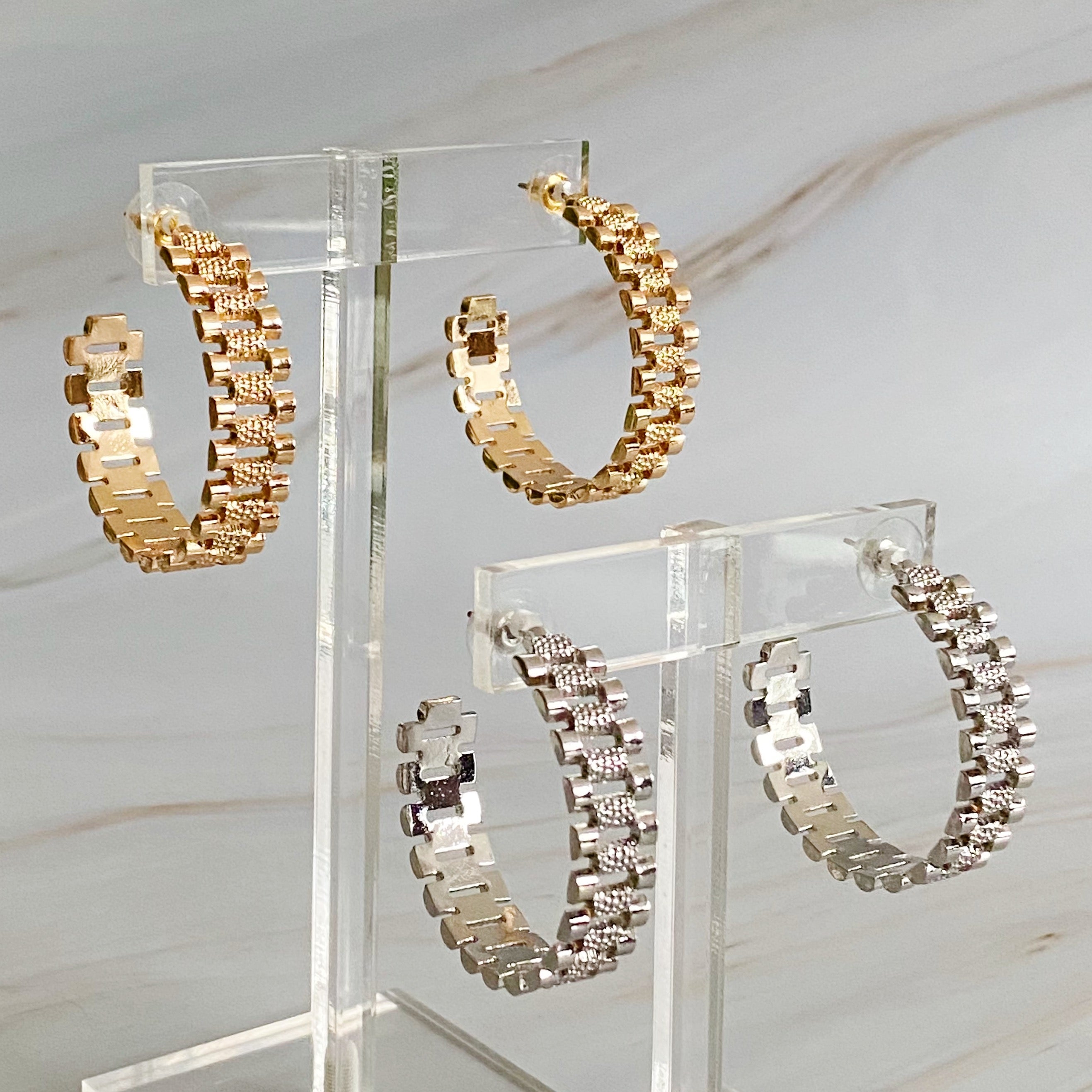Elegant Golden Watch Band Hoop Earrings with a sleek design, perfect for any occasion.