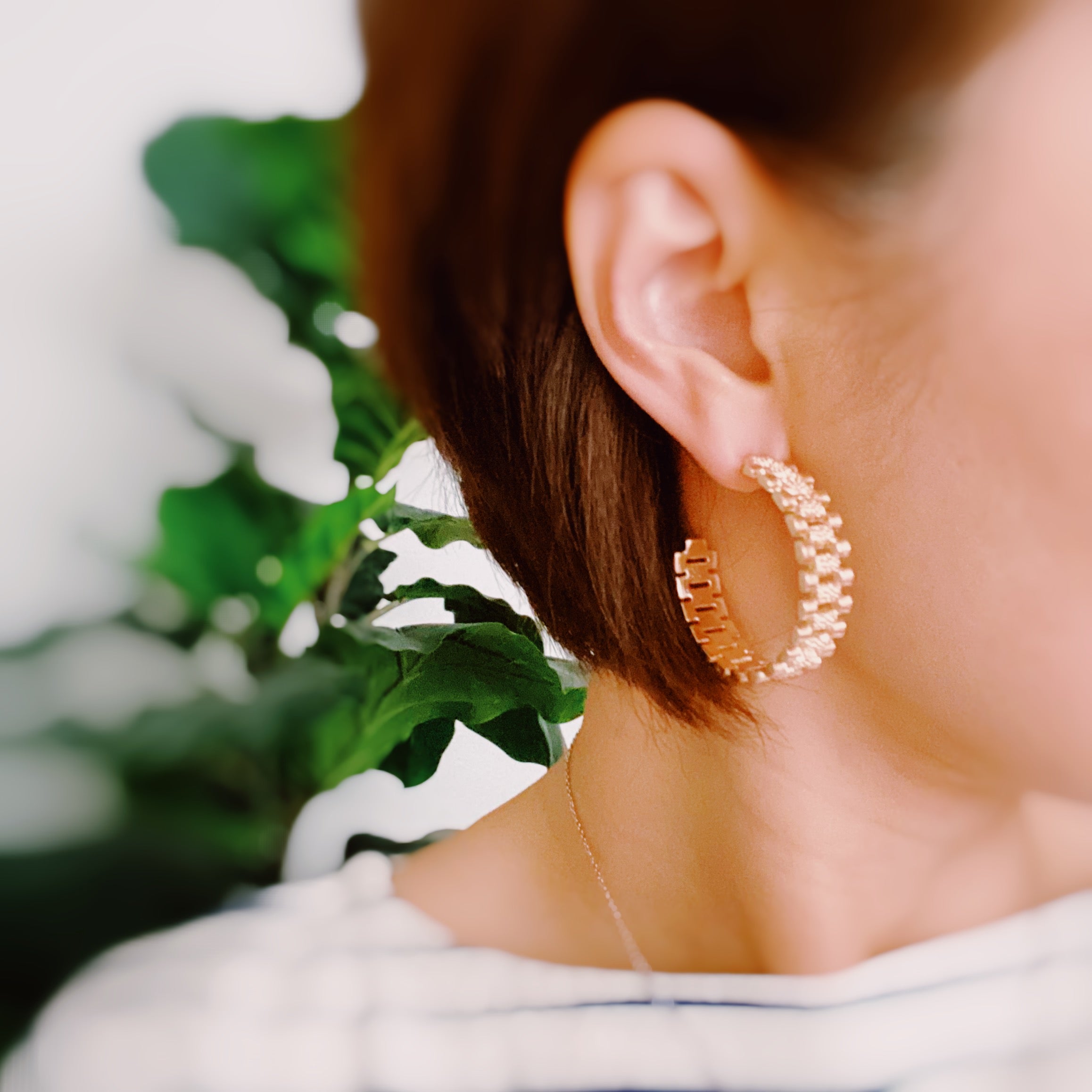 Elegant Golden Watch Band Hoop Earrings with a sleek design, perfect for any occasion.