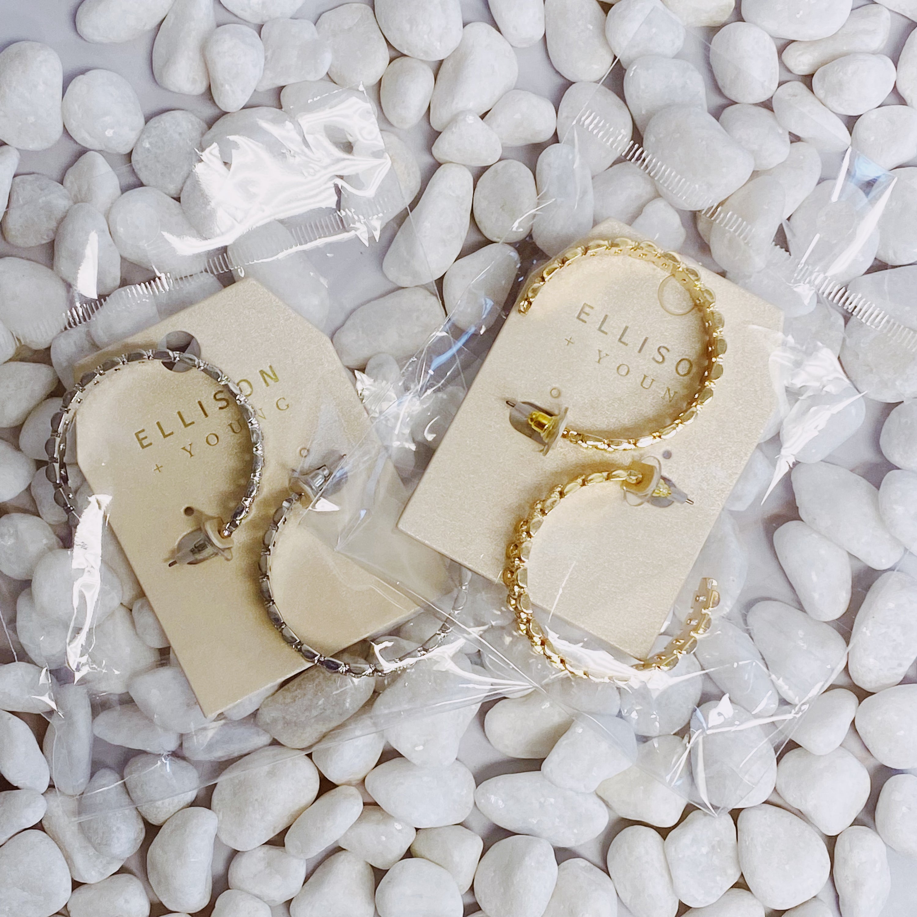 Elegant Golden Watch Band Hoop Earrings with a sleek design, perfect for any occasion.