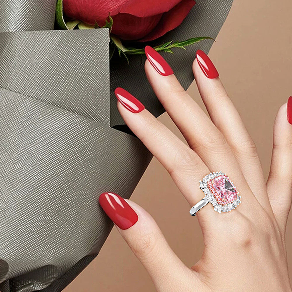 A stunning Gorgeous Halo Engagement Ring made of 925 Sterling Silver with a white gold finish, featuring a beautiful halo design around the central stone.