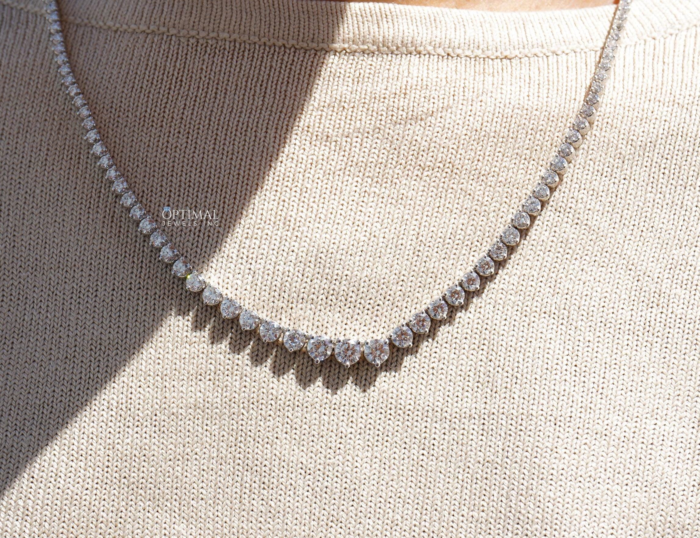 Gorgeous round lab grown diamond necklace featuring 20.50 CTW in an elegant tennis design, set in 18K white gold.